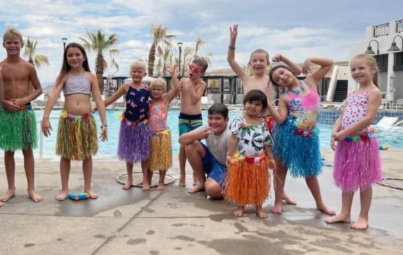 kids attending a luau event at a St. George vacation rental